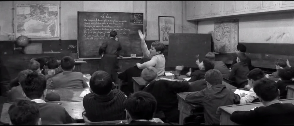 The All Boys School, the students are seen poking fun at the lecturer